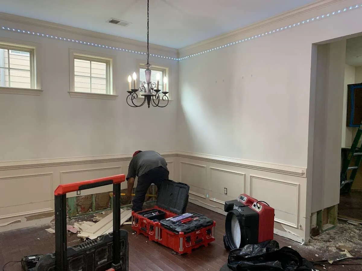 Restoration technician with professional equipment in Branford